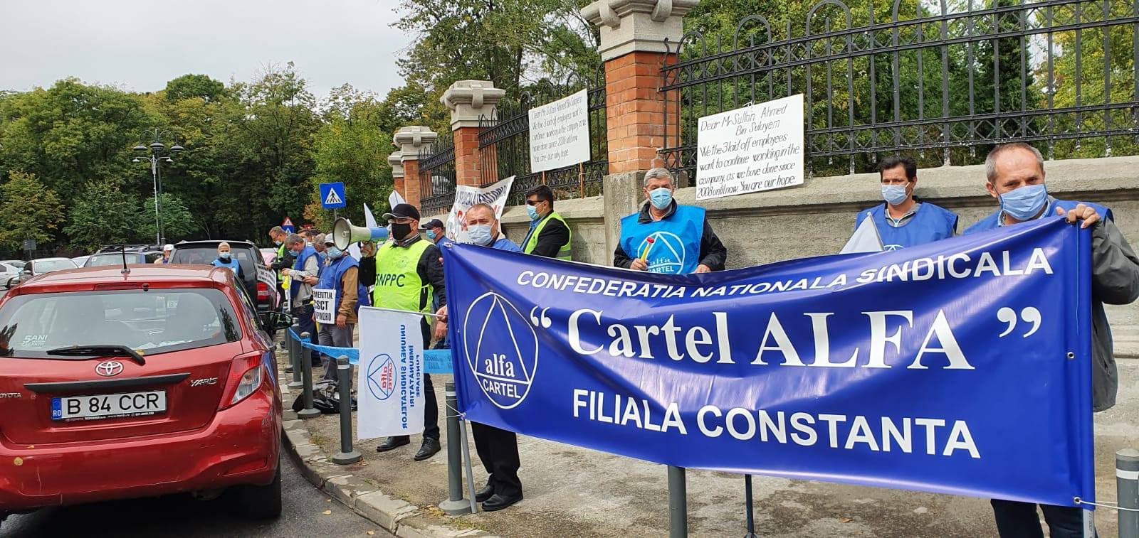 Cartel Alfa protestează în faţa Ambasadei Emiratelor Arabe Unite după trei angajaţi ai companiei Constanţa South Container Terminal au fost concediați. Unul dintre angajaţi e liderul de sindicat