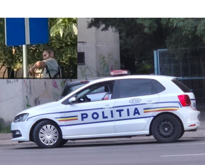 VIDEO Constanța: Un angajat al unei firme de securitate, filmat pe stradă înarmat și băut, identificat de polițiști în amendat